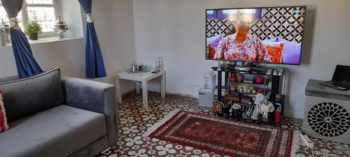 Et tv og/eller underholdning på Batha Cozy Flat