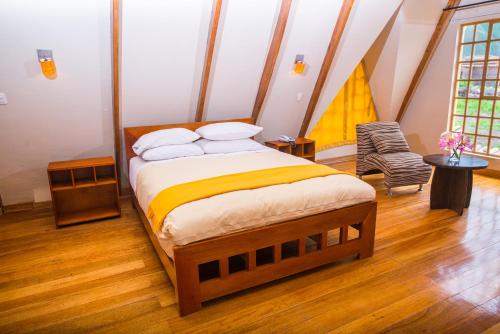 Postel nebo postele na pokoji v ubytování Amaru Valle Hotel
