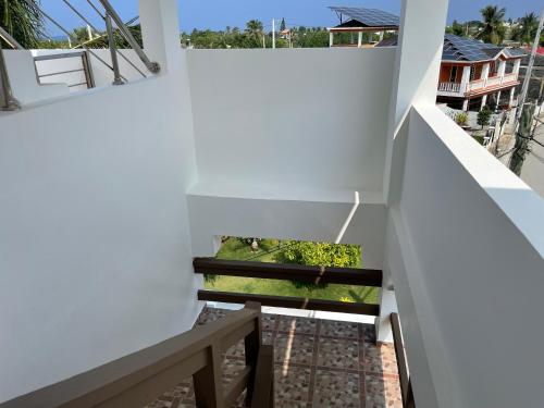 a view from the balcony of a house with stairs at Apartamento Carey in Cabrera