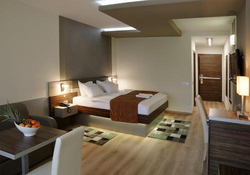 Säng eller sängar i ett rum på Terme Paradiso - Hotel Paradiso
