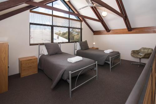 
A bed or beds in a room at Dunsborough Beach Cottages
