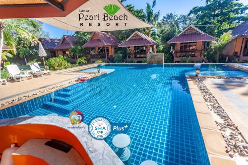 a swimming pool at the pearl beach resort at Lanta Pearl Beach Resort in Ko Lanta