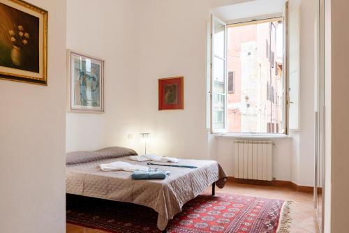 Posteľ alebo postele v izbe v ubytovaní Borgo Stretto Bright Apartments