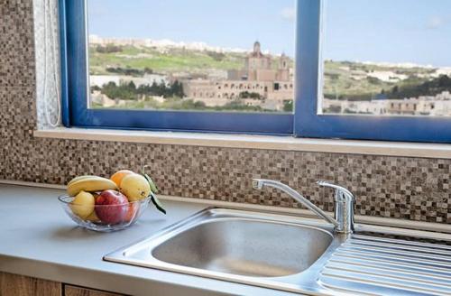 Fotografie z fotogalerie ubytování Ir-Rixa Holiday Penthouse v destinaci Għajnsielem