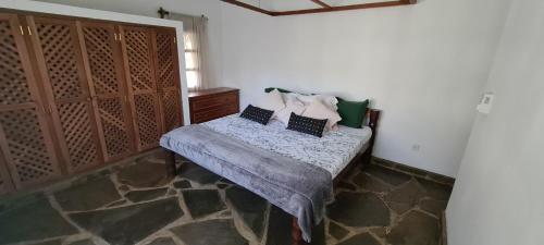 Ένα ή περισσότερα κρεβάτια σε δωμάτιο στο Lion Garden Villas