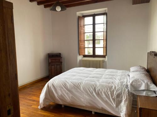 Postel nebo postele na pokoji v ubytování Blissful Galician Retreat