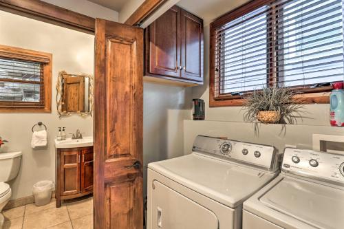 a laundry room with a washer and a sink at Downtown Park City Vacation Rental Near Ski Lift! in Park City