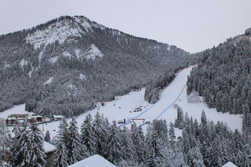 a snow covered mountain with a ski slope at CHALET NORA in San Vigilio Di Marebbe