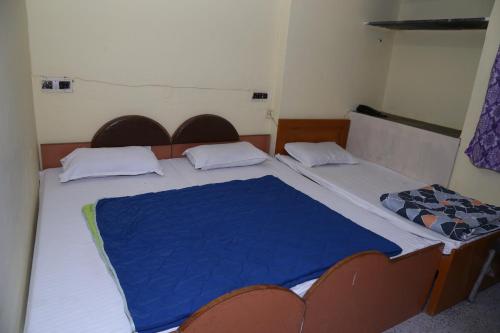 Ένα ή περισσότερα κρεβάτια σε δωμάτιο στο Hotel Shri Karni Vilas & SPA