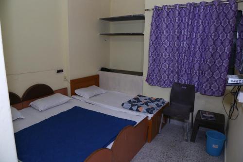 Ένα ή περισσότερα κρεβάτια σε δωμάτιο στο Hotel Shri Karni Vilas & SPA