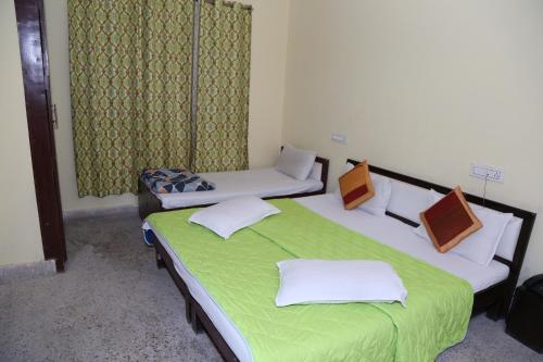 Ένα ή περισσότερα κρεβάτια σε δωμάτιο στο Hotel Shri Karni Vilas & SPA