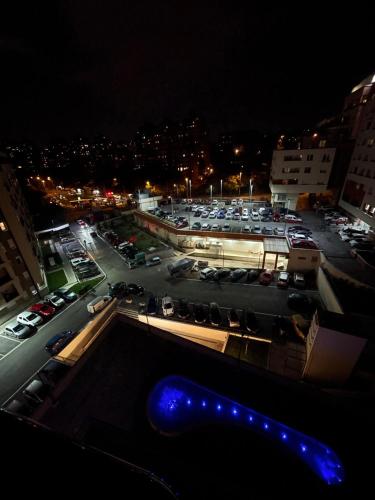 a view of a parking lot at night at Paunov Breg in Jajinci