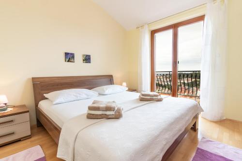 Postel nebo postele na pokoji v ubytování Maris