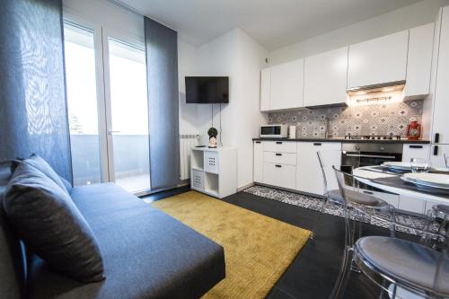 O bucătărie sau chicinetă la Il Puccino - Modern Apartment