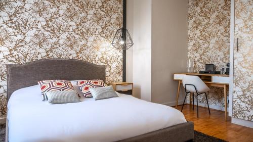 A bed or beds in a room at LA CASA DEL GUSTO