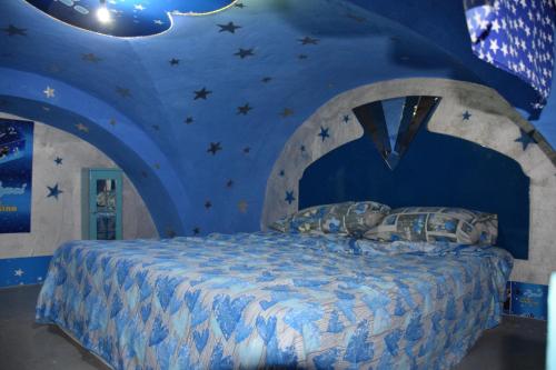 Posteľ alebo postele v izbe v ubytovaní Catania Centro Central Baci Perugina