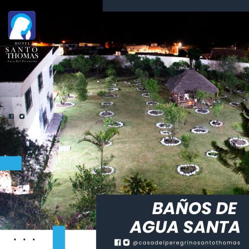 an aerial view of a resort yard at night at Casa del Peregrino Santo Thomas in Baños