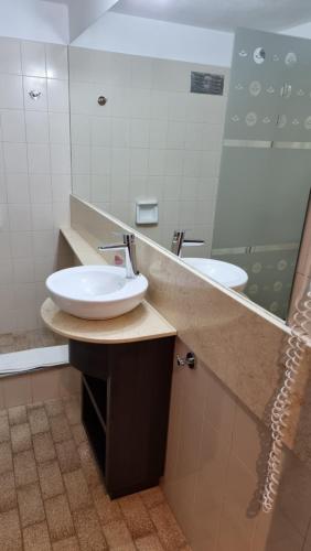 Kylpyhuone majoituspaikassa Hotel Ikera