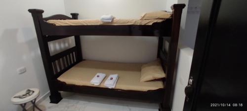 Hospedaje Bolivar Alcalaにあるベッド