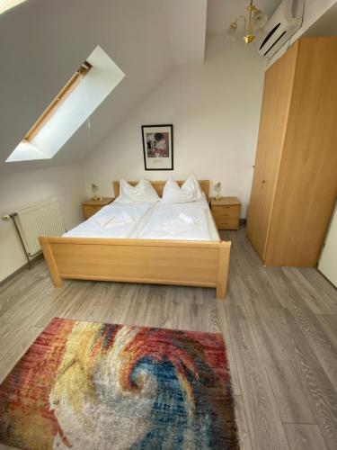 
Ein Bett oder Betten in einem Zimmer der Unterkunft Pension Lizzi
