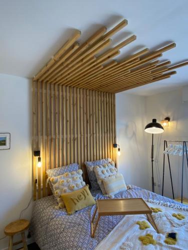 Кровать или кровати в номере Studio Beach House à Sangatte bord de plage