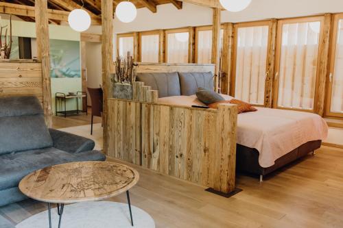 A bed or beds in a room at Exklusives Loft "Auszeit für2"