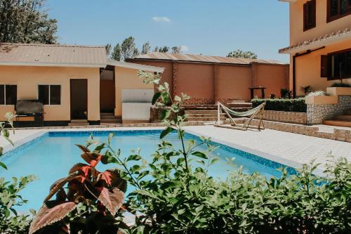 Villa Viva Tanzaniaの敷地内または近くにあるプール
