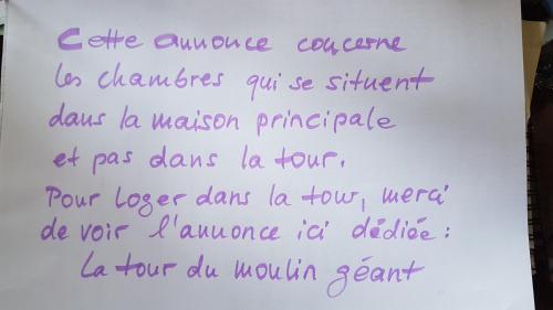 a piece of paper with purple handwriting on it at Au Moulin Géant in Rochefort-sur-Loire