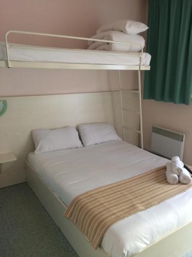 Katil atau katil-katil dalam bilik di Europe Hotel