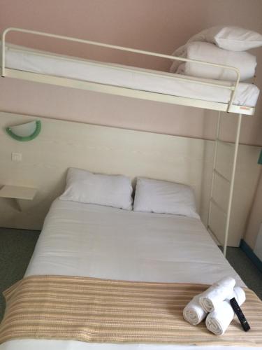 Katil atau katil-katil dalam bilik di Europe Hotel