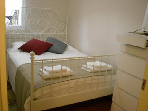 A bed or beds in a room at Konakli Apartments Izmir