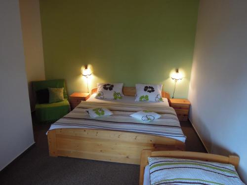 Postel nebo postele na pokoji v ubytování Pension Apartmány Sport Čermák