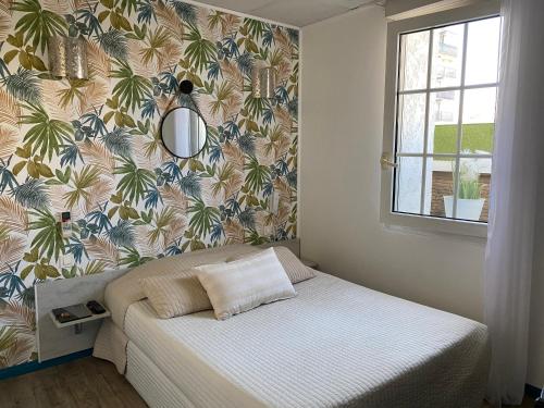 Postel nebo postele na pokoji v ubytování Hotel Abelia