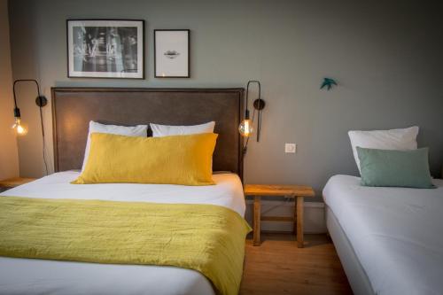 Ένα ή περισσότερα κρεβάτια σε δωμάτιο στο Hello Colmar, Duplex Cathedrale, historic center