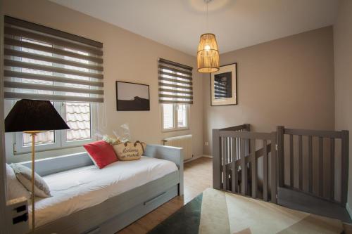 Ένα ή περισσότερα κρεβάτια σε δωμάτιο στο Hello Colmar, Duplex Cathedrale, historic center