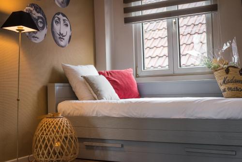 Ένα ή περισσότερα κρεβάτια σε δωμάτιο στο Hello Colmar, Duplex Cathedrale, historic center