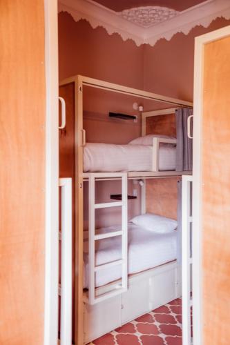 a bunk bed room with two bunk beds at Ojala in Antigua Guatemala