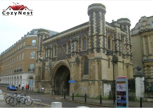 an old building with bikes parked in front of it at RiverView 1 Bed Apartment with Parking by CozyNest in Reading
