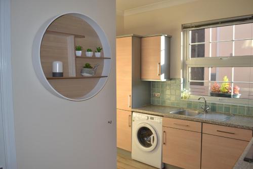 Køkken eller tekøkken på Frinton Escapes - The Cottage