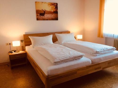 מיטה או מיטות בחדר ב-Haus Böhler