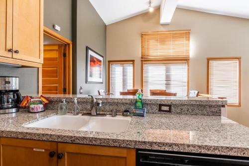 a kitchen with a sink and a counter top at Snowcreek V 963 in Mammoth Lakes