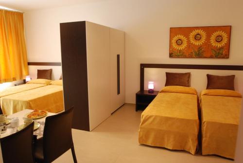 Кровать или кровати в номере B&B Fiera Maglo'