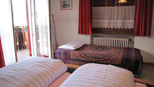 En eller flere senge i et værelse på Blasbichler Appartments