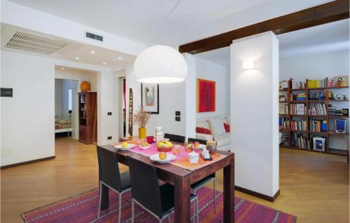 a dining room with a table and chairs at Beautiful apartment in Venezia -VE- with 2 Bedrooms and WiFi in Venice