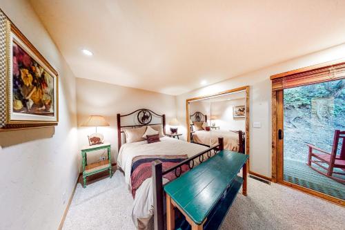 a bedroom with two beds and a window at Warm Springs Wonder in Ketchum