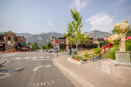 an empty street in a town with a stop sign at Warm Springs Wonder in Ketchum