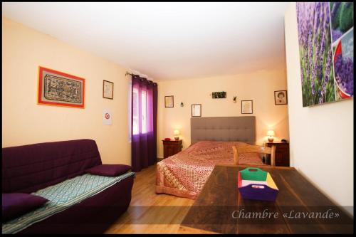 En eller flere senge i et værelse på Ô Doux s'Home