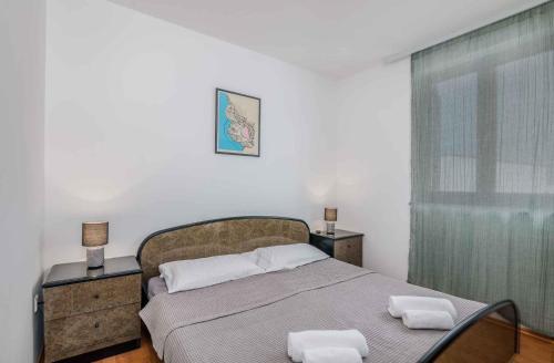 Postel nebo postele na pokoji v ubytování Apartment in Klimno - Insel Krk 41835