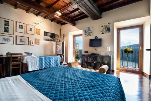 Una cama o camas en una habitación de Atlantis Inn Castelgandolfo