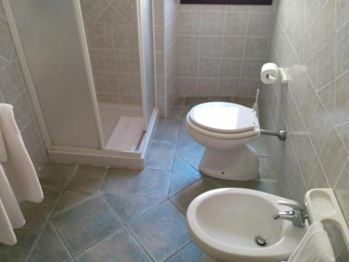 Ванная комната в Hotel Cavour